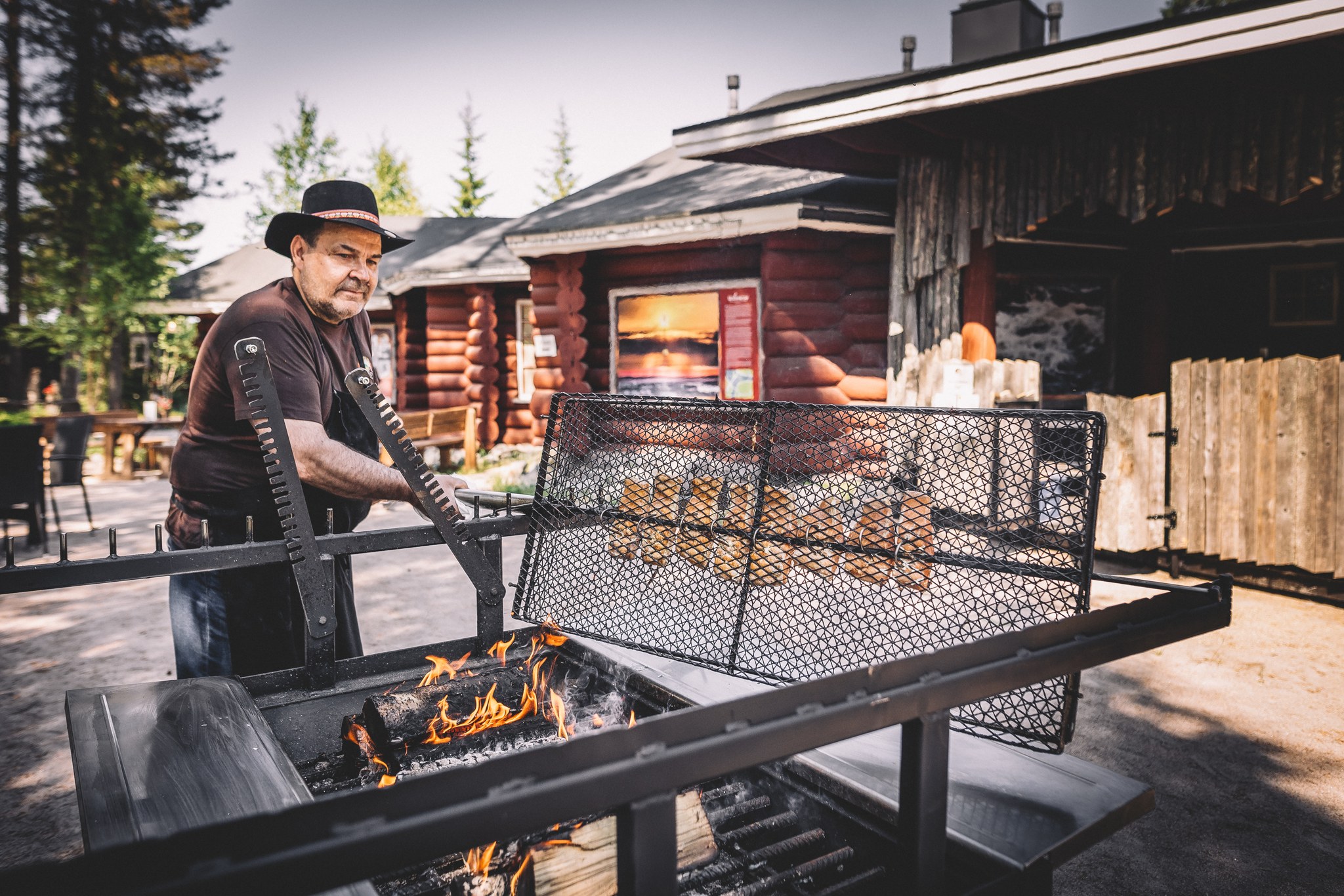 ummer-outdoor-restaurant-in-santamus-at-the-arctic-circle-lunch-prepared-over-an-open-fire-
